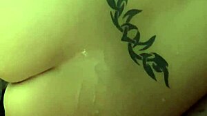 cumshot lands on lisa's tattooed ass during masturbation