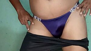 bailando en tanga satinada morada victorias secret teasing with dildo and ripped clothes