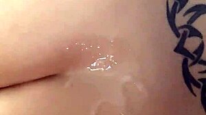 cumshot lands on lisa's tattooed ass during masturbation