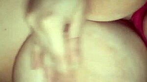 Amateur sucks her big natural tits