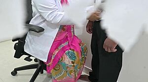 Indian doctor in clinic thoroughly examines patient's cock, with nurse assisting in detailed check