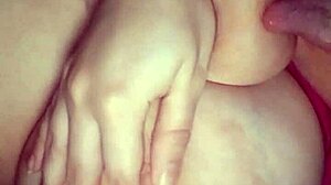 Amateur sucks her big natural tits