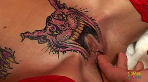 skinny blonde with pussy tattoo rides to creampie on red couch