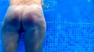 Blonde couple enjoys tight pussy play and hot sex in the pool water.