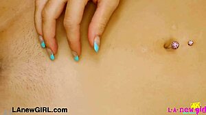 Blonde model teases with sensual body caresses on sofa