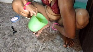 desi girl shaves pussy hair while bathing with clear voice