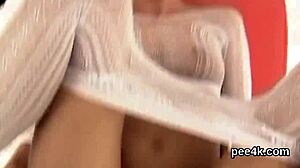 Attractive idol spreads pussy for warm pee burst.