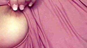 Hot blonde amateur shows off tattooed tits in panties at home