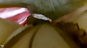 french amateur in red satin lingerie outfit teases with garter belt and thong before intimate play