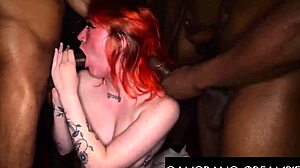 Inked fiery redhead loves creampie in gangbang