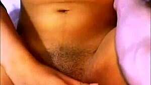 Art student enjoys painting session turning passionate with classmate