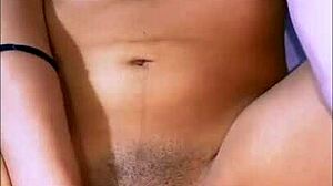 Art student enjoys painting session turning passionate with classmate