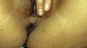 bold close-up fingering of wet pussy