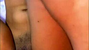 Art student enjoys painting session turning passionate with classmate