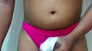 Who is wearing erotic panties and masturbating?