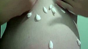 Pregnant blonde in lingerie gets massage