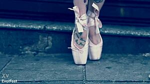 Why is this ballerina in ballet shoes strolling down the street?