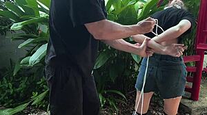 I punished her by tickling her feet outdoors