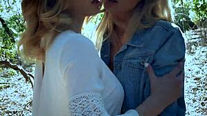 Scarlet Red and Blake Eden enchant with their shaved pussies outdoors