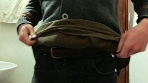 Skinny amateur strips half-naked in bathroom, masturbates and gets loaded cumshot.