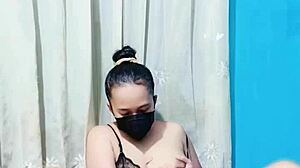 i love this housewife in bikini masturbating with a dildo, her big tits bouncing