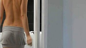 solo gal puts vibrator in tight pussy