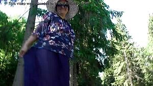 Hairy mature flashes chubby beaver in public park under skirt.