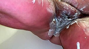 Mature BBW shaves her legs, pussy, and ass seductively