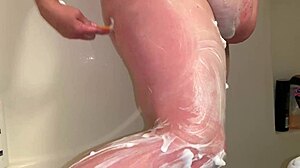 Mature BBW shaves her legs, pussy, and ass seductively