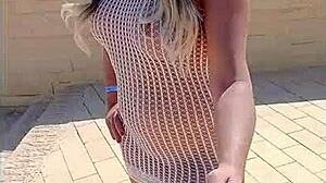 Beautiful Blonde Flashes Big Tits and Ass in See-Through Dress Outdoors