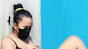 i love this housewife in bikini masturbating with a dildo, her big tits bouncing