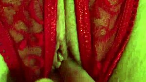 Is That Shaved Pussy Wet in Red Thongs?