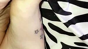 pretty tattooed feet get worshipped in fetish play