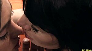 Brunette lesbians share a dildo. They finger and lick soaking wet pussies with big tits.