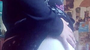 Before she fucks herself, she has to feel her ass and tits