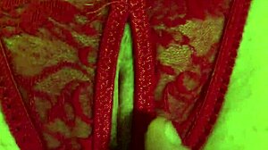 Is That Shaved Pussy Wet in Red Thongs?