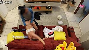 Hot wife welcomes delivery boy for sex on sofa at home
