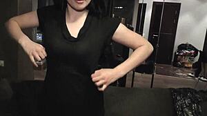 Ella Martin participates in her first video casting, demonstrating fingering and gaping techniques on the sofa.