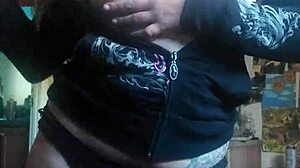 Before she fucks herself, she has to feel her ass and tits