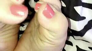 pretty tattooed feet get worshipped in fetish play