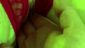 Is That Shaved Pussy Wet in Red Thongs?