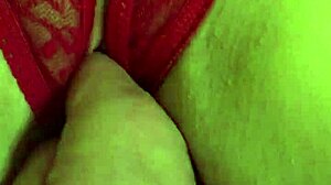 Is That Shaved Pussy Wet in Red Thongs?