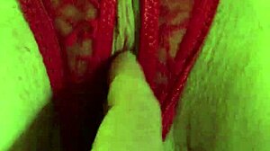 Is That Shaved Pussy Wet in Red Thongs?