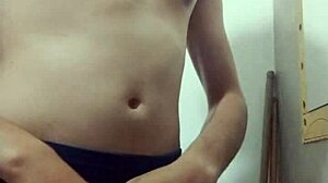 skinny young guy says, 'watch me undress and stroke my big cock in the bathroom'