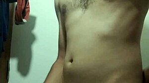 skinny young guy says, 'watch me undress and stroke my big cock in the bathroom'