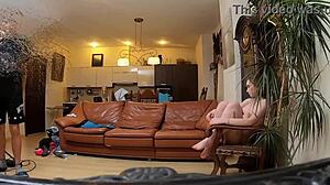 Naked model poses during intimate photoshoot.