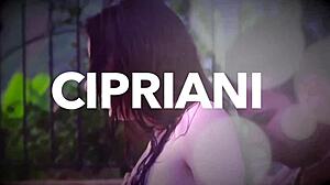 Busty brunette engages in intimate activity with a large partner