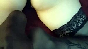 doing a footjob in stockings for the first time, leading to a cumshot