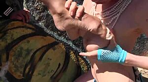 intriguing outdoor beach lesbian action with nympho moaning