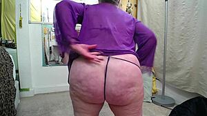 Mature Woman In Purple Set Teases With Bra And Thong